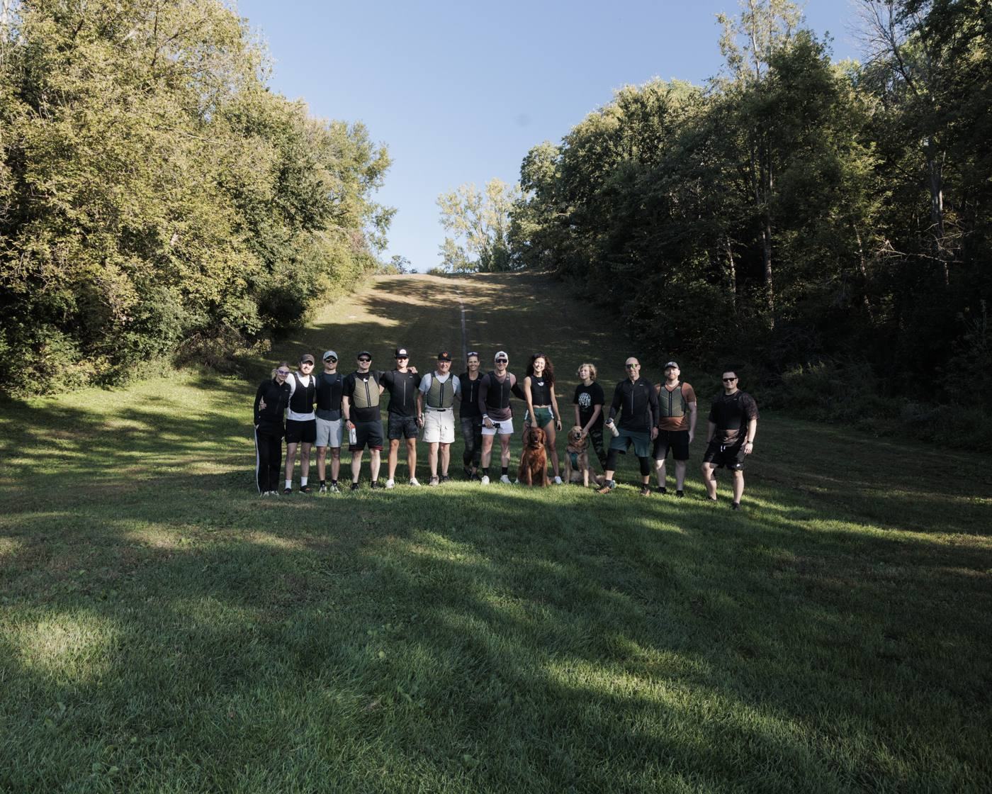 Group of coworkers taking on a shared physical challenge together at a Let's Fuel Growth summit